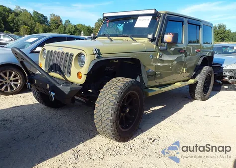 2013 Jeep Wrangler Unlimited Freedom Edition из США, поврежденный, VIN 1C4HJWDGXDL584549